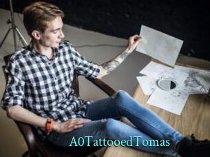 A0TattooedTomas